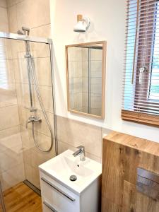 Łazienka w obiekcie Apartament z ogrodem
