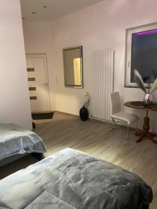 Postel nebo postele na pokoji v ubytování N-City