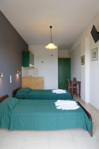 Krevet ili kreveti u jedinici u objektu Habitat Villa Corfu