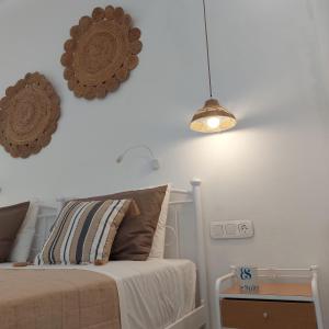 Ein Bett oder Betten in einem Zimmer der Unterkunft Elite Suites Naxos