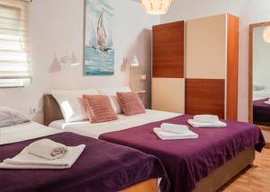 Un pat sau paturi într-o cameră la Villa Danka