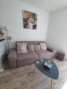 Posedenie v ubytovaní appartement rénové et lumineux a mers les bains au dessus d'un ancien commerce mersois en duplex pour 4 personnes pour du repos, des vacances ou pour le travail
