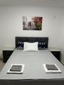 A bed or beds in a room at Apartments MASIMO