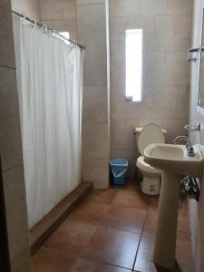Ванная комната в HOTEL PLAZA