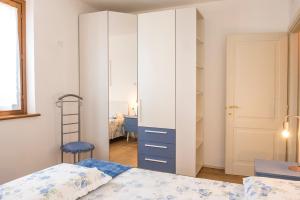 Ένα ή περισσότερα κρεβάτια σε δωμάτιο στο Casa del Fattore