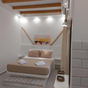 Ein Bett oder Betten in einem Zimmer der Unterkunft Elite Suites Naxos