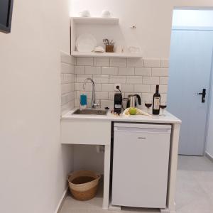 Küche/Küchenzeile in der Unterkunft Elite Suites Naxos