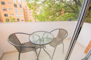 Balkón nebo terasa v ubytování Loft moderno en El Poblado con vista y parqueadero Mio Lofts