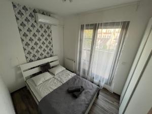 Postel nebo postele na pokoji v ubytování ZMRD Resort + 17 fotografií