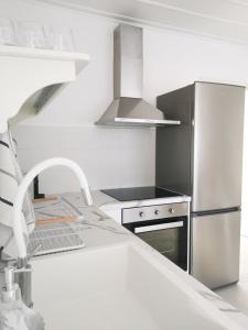 A kitchen or kitchenette at Evgenia Seafront House