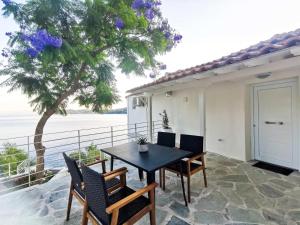A balcony or terrace at Evgenia Seafront House