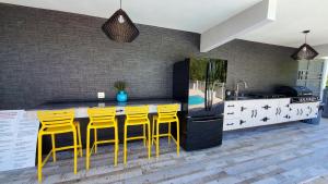Galería fotográfica de Palm's Bohemian House with Private Pool en Aguada