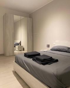 Posteľ alebo postele v izbe v ubytovaní Shining house in Milan