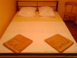 Кровать или кровати в номере Ezerkiemis