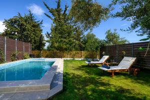 Bazén v ubytování Playia Villas II nebo v jeho okolí