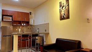 Η κουζίνα ή μικρή κουζίνα στο Pacifico Apart Hotel