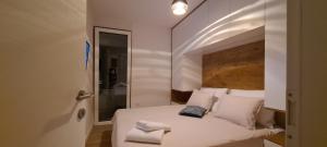 Posteľ alebo postele v izbe v ubytovaní Apartman Marčelina 2 in Trogir