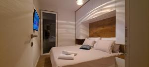 Posteľ alebo postele v izbe v ubytovaní Apartman Marčelina 2 in Trogir