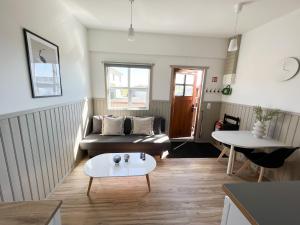 Zona de estar de Garður Apartments