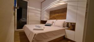 Posteľ alebo postele v izbe v ubytovaní Apartman Marčelina 2 in Trogir