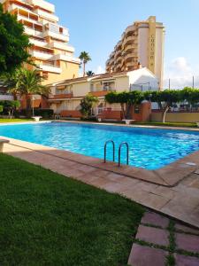 Bazén v ubytovaní Apartamento PARADISE Solo Familias alebo v jeho blízkosti