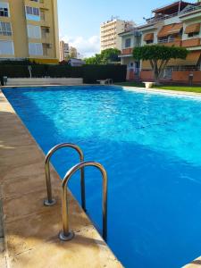 Bazén v ubytovaní Apartamento PARADISE Solo Familias alebo v jeho blízkosti