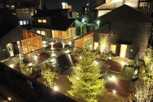 an aerial view of a house at night with lights at Maebashi - House - Vacation STAY 64432v in Maebashi