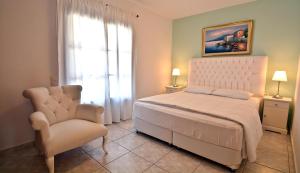 Cama ou camas em um quarto em Anna Maria - Vanessa Apartments