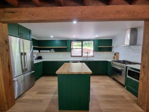 A kitchen or kitchenette at Carawirry Forest Escape