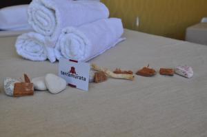 Voodi või voodid majutusasutuse Terra Murata Boutique b&b toas