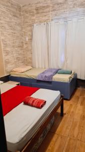 Hostel Lagoa do Sol客房内的一张或多张床位