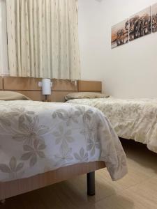 Posteľ alebo postele v izbe v ubytovaní APARTAMENTO ZONA MARINADOR, CERCA A LA PLAYA