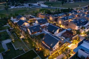 an overhead view of a city at night at voco Nanjing Garden Expo by IHG in Nanjing