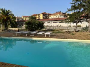 The swimming pool at or close to Il Gattino di Porto - apt 4 - Monolocale terrazzo piscina