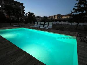 The swimming pool at or close to Il Gattino di Porto - apt 4 - Monolocale terrazzo piscina