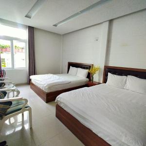 Giường trong phòng chung tại Phuong Vy 2