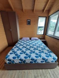 Ένα ή περισσότερα κρεβάτια σε δωμάτιο στο The Great Escape Homestay, Gagar, Nainital