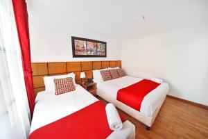 Postelja oz. postelje v sobi nastanitve Hotel Embajada Real