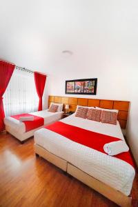 Postelja oz. postelje v sobi nastanitve Hotel Embajada Real