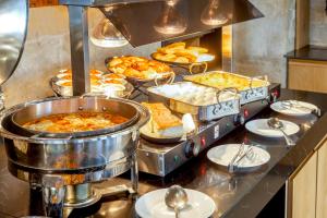 a buffet with many different types of food at Ramon Suites by Smart Hotels in Mitzpe Ramon