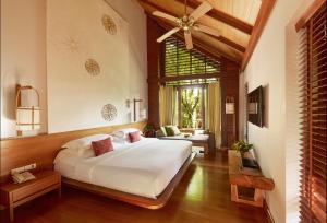 Кровать или кровати в номере The Tubkaak Krabi Boutique Resort