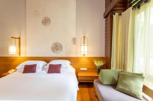 Кровать или кровати в номере The Tubkaak Krabi Boutique Resort