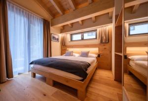 Postel nebo postele na pokoji v ubytování Hotel Tannenhof