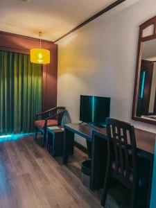 TV a/nebo společenská místnost v ubytování Neo Hatyai Hotel