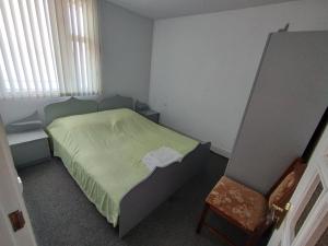 Кровать или кровати в номере Sevan - White House