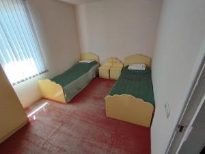 Кровать или кровати в номере Sevan - White House
