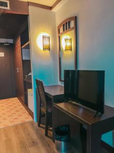 TV a/nebo společenská místnost v ubytování Neo Hatyai Hotel