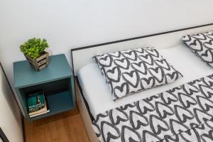 Posteľ alebo postele v izbe v ubytovaní Apartment Helena Rovanjska
