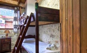 Posteľ alebo postele v izbe v ubytovaní Stone Village Hotel Apartments