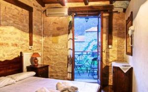 Posteľ alebo postele v izbe v ubytovaní Stone Village Hotel Apartments